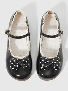 Black solid color lace + polka dot bow.