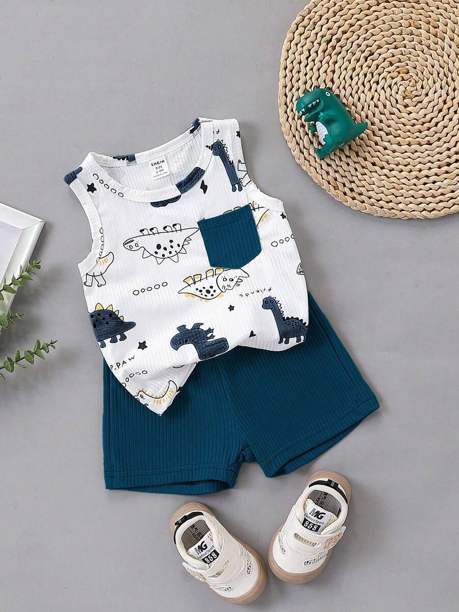 SHEIN Conjunto de top sin mangas con estampado de dinosaurio de dibujos animados y pantalones cortos verdes lisos para bebé niño, con un estilo alegre y lindo, adecuado para aventuras al aire libre, ropa cómoda para el hogar y momentos felices de fiesta - Azul - Ver 1