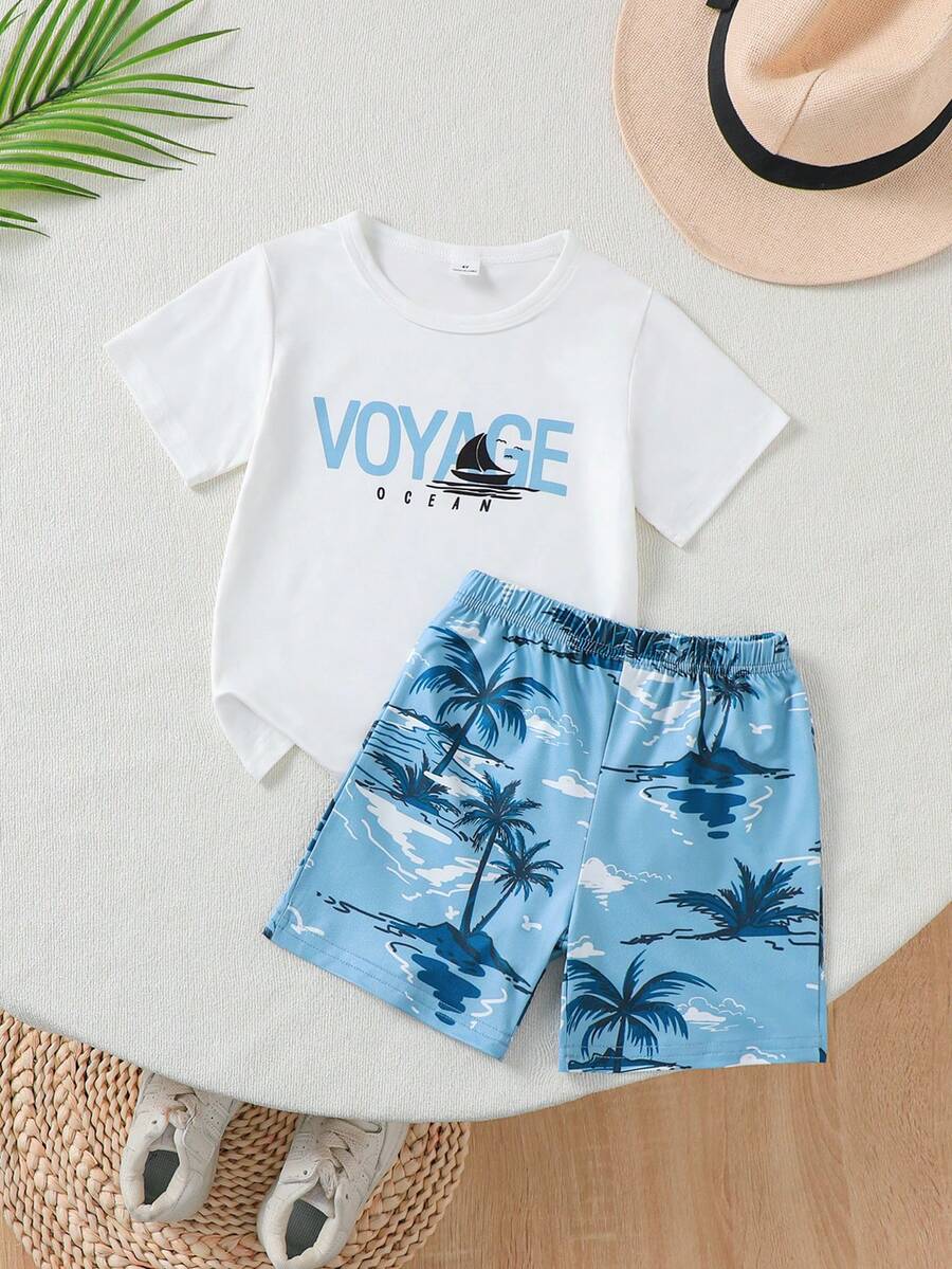 SHEIN 两件套男童夏季套装，休闲白色T恤印有“VOYAGE OCEAN”标语，宽松蓝色短裤饰有海洋沙滩度假主题，舒适的夏季沙滩度假幼儿男童短袖短裤套装 - 白色 - 查看 1