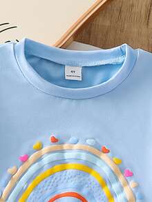 SHEIN Bộ 2 món gồm áo thun in hình cầu vồng và trái tim cùng quần dài thoải mái dành cho bé gái. - Màu xanh lam - Xem 3