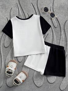 SHEIN HOT STUFF 2pcs Baby Boy Casual Contrast Color Cartoon Print Round Neck Short Sleeve T-Shirt And Shorts Set, Summer - Black and White - View 2