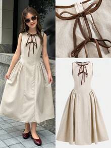 Firerie Kids 少女新款圆领镂空撞色系带腰侧荷叶边下摆无袖褶皱连衣裙，后背拉链，时尚、年轻、优雅、百搭，收腰设计，适合春、夏、秋、冬四季穿着。 - 杏色 - 查看 8