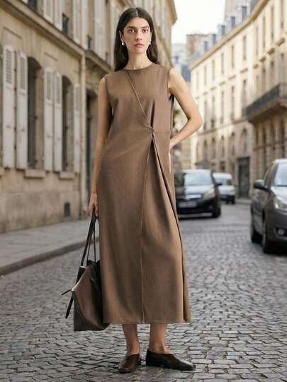 Ontre 女士棕色咖啡色舒适亲肤亚麻质感面料，小圆领修身A字无袖连衣裙，不对称前片设计，彰显现代都市休闲商务时尚，低调奢华，尽显优雅气质，是都市通勤、高端机场穿搭的理想之选。这款连衣裙采用设计师简约风格，舒适百搭，是都市系列的经典之作。