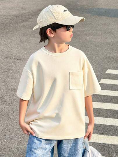 青少年男童白色华夫格纹口袋圆领短袖T恤，舒适、时尚、简约、百搭、柔软透气，适合春夏穿着，适合日常穿着、户外活动、上学、街头风、派对和休闲场合。