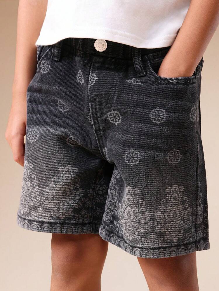 Pantaloncini in denim con stampa paisley e design elaborato