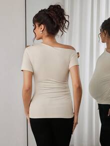 Momance Maternity T-Shirt With Oblique Shoulder, Short Sleeve, Waist Ruched, Embroidered Floral Decor, Fitted - Apricot - View 2