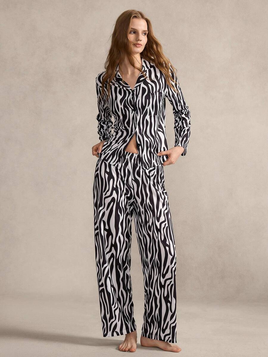 SHEIN Women's Pajama Set, With Classic Black And White Zebra Print As The Main Pattern, Featuring A Lapel Collar, Open Front Design, And Simple Pocket Details. The Comfortable Functionality Of Sleepwear Is Combined With The Edgy Animal Print Element, Balancing Between Casual And Personalized. - Black and White - View 1