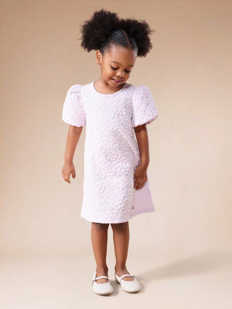 Robe courte texturée à manches bouffantes et découpe