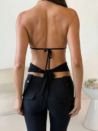 SHEIN Glamour Women's Black Knit Top With Metal Collar Necklace, Backless Design, Sexy Vacation Versatile Blouse, Suitable For Vacation, Music Festivals, Parties Black Halter Draped Crop Top Easter Brunch Elegant Draped Halter Top Vintage Minimalist Halter Crop Top Elegant Halter Neck & Draped Silhouette Spring Break Minimalist Sexy Outfit Coachella Festival Edgy Black Look Halter Neckline With Draped Front Detail Solid Black Color Palette Minimalist Edgy & Sexy Aesthetic Timeless Minimalist Fashion Staple Ha