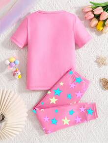 1 bộ đồ ngủ cho bé gái in hình kỳ lân phát sáng trong bóng tối, gồm áo thun ngắn tay cổ tròn ôm sát và quần dài. - Hồng - Xem 3