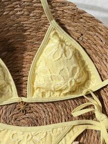 SHEIN Swim Mod 2026 Spring/Summer Yellow Floral Special Fabric Spaghetti Strap Halter Backless Drawstring Side Solid Color Women Bikini Set Set, Suitable For Beach Photography, Sweet Vacation Butter Yellow Two Piece Set Butter Yellow Bikini Yellow Bathing Suit Set Lemon Bathing Suit Textured Bikini - Yellow - View 4
