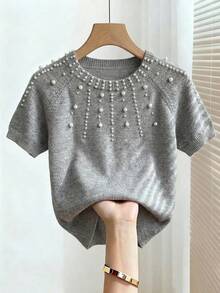Franclia Áo dệt kim tay ngắn màu xám thanh lịch và đa năng, điểm xuyết ngọc trai giả ở cổ áo và vai, phù hợp cho mùa thu, đông và xuân, hoàn hảo cho mùa hè. Cũng thích hợp để mặc vào mùa xuân, ngày Valentine, lễ hội Carnival. - Xám - Xem 8