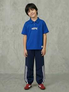 Casuvi Kids Oversized Relaxed Fit Collegiate Sports Style Polo Shirt For Tween Boy, Dropped Shoulder, Print On Hem, White Woven Label On Front Hem, Suitable For School, Light Sports, Weekend Leisure Streetwear Teens Boys Polos Solid Color Tops Kids - Blue - View 1