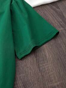 EMERY ROSE Koszulka damska z nadrukiem na Dzień Świętego Patryka – luźna koszulka z krótkim rękawem i okrągłym dekoltem z wyrazistym wzorem koniczyny, idealna do wiosennych i letnich stylizacji, T-shirty damskie, zielona koszulka damska z nadrukiem, zielona koszulka z nadrukiem, zielone koszulki z nadrukiem, damskie koszulki vintage, damskie - Zielony - Zobacz 5