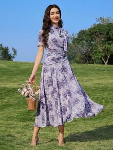 Modelyn Đầm nữ thanh lịch in hoa, cổ xoắn, eo nhún, thích hợp cho mùa hè. - Màu tím - Xem 3