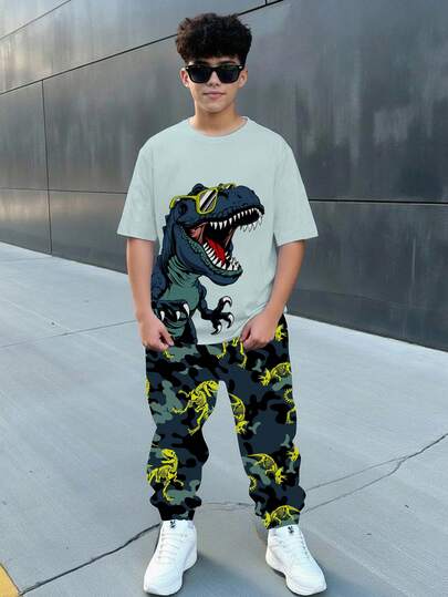 青少年男童休闲简约时尚百搭恐龙、迷彩、涂鸦印花宽松舒适圆领短袖T恤和裤子套装，运动风格