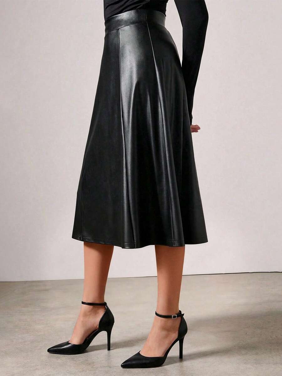 COSMINA Damen eleganter, moderner Pendler-Lederrock aus PU-Leder mit mittlerer Taille und mittlerer Länge in A-Linie, vielseitig einsetzbar für den Arbeitsweg, Büro, Ausflüge, Alltagskleidung, Dates, Valentinstag, Weihnachten - Schwarz - Übersicht 1