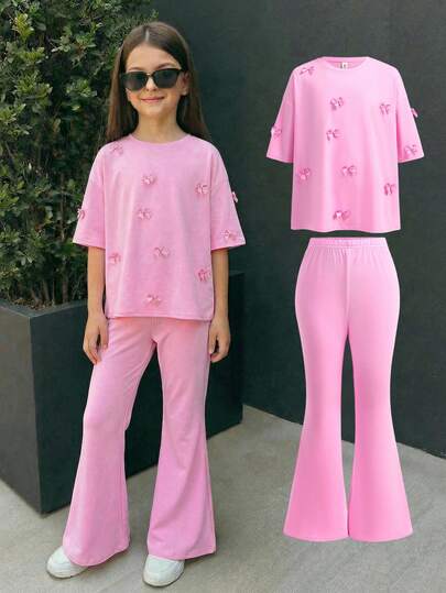 Firerie Kids 2 piezas Conjunto informal de niña preadolescente con camiseta rosa holgada de cuello redondo con decoración de lazo y pantalones acampanados