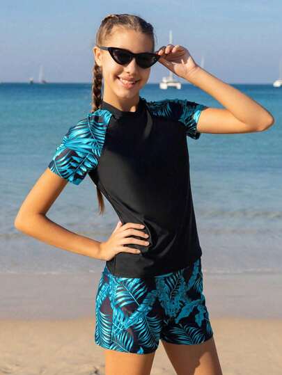 SHEIN Teen Girls Tankinis: Youth (Women's) Strapless Bikini Top And Bottom Set For Casual Beach Wear In Blue. Tropical Rainforest Print, Fashionable, Chic, And Elegant. Perfect For Swimming, Summer Vacations, Beach, Pool, Summer Holiday Parties, And Casual Getaways Teen Girl Swim Rash Guard Teen Girls Short Sleeve And Shorts Swimsuit Modest Swimsuit For Women Swim Suites Two Piece Longer Top Teens Swim Dress For Teens