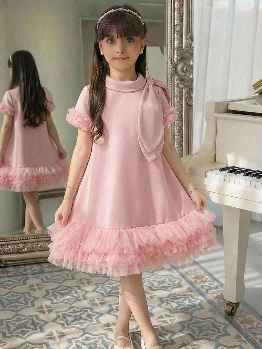 SHEIN 女童通勤优雅无袖A字连衣裙,立领设计,下摆和袖口处拼接网纱。女童场合连衣裙,优雅纯色连衣裙,可爱优雅荷叶边连衣裙,优雅粉色蝴蝶结女童连衣裙,小巧优雅连衣裙 - 粉色 - 查看 1