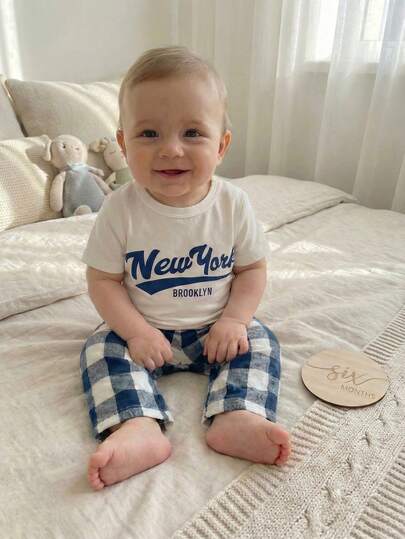 2pcs/Set Toddler Boys' Minimalist Stylish English Text White Knit Short Sleeve Top Paired With Blue & White Plaid Print Relaxed Fit Pants, Comfortable Casual Homewear Set