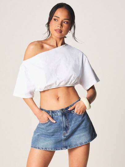 MISSGUIDED Váy ngắn denim cạp cao với hàng cúc cài phía trước cổ điển và thiết kế năm túi, hoàn hảo cho trang phục thường ngày mùa hè.