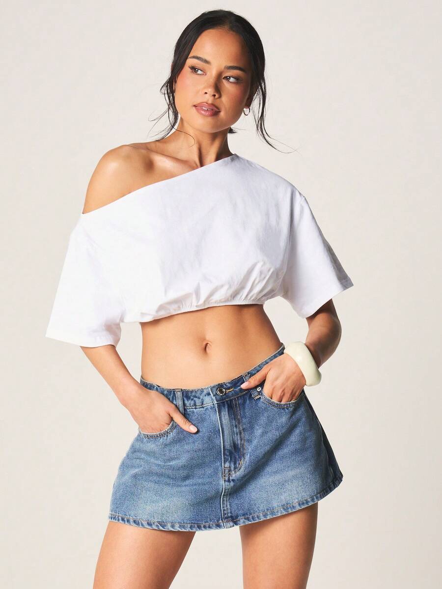 MISSGUIDED Minifalda pantalón de mezclilla de talle alto con cierre frontal de botones clásico y diseño de cinco bolsillos, perfecta para el uso casual de verano en el día a día - Azul lavado medio - Ver 1
