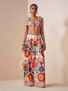 Zivah Lễ hội âm nhạc Xuân/Hè 2026, Lễ Phục Sinh, Ngày Thánh Patrick, Phong cách miền Tây, Phong cách du mục, Tiệc sinh nhật, Lễ tốt nghiệp, Phong cách đại học, Trang phục sinh viên, Thường ngày, Cơ bản đa năng, Giải trí, Kỳ nghỉ, Du lịch tàu biển, Bãi biển, Tắm nắng, Phong cách thịnh hành, Thời trang đường phố, Khách dự đám cưới phong cách Boho, Đi làm, Ăn sáng muộn, Sân bay, Tiệc tùng, Đi chơi ngày lễ, Kỳ nghỉ thường ngày. Bộ 2 món áo crop top quây dây nơ + quần ống rộng dài in họa tiết nhiều màu sắc dành cho nữ - B - màu nâu - Xem 6