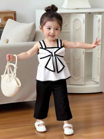 Souflis Souflis Infant/Toddler Girls' Ivory Camisole Top With Bow Accent And Solid Straight Leg Pants Set, Summer Children Fashion Comfortable Casual Outfit