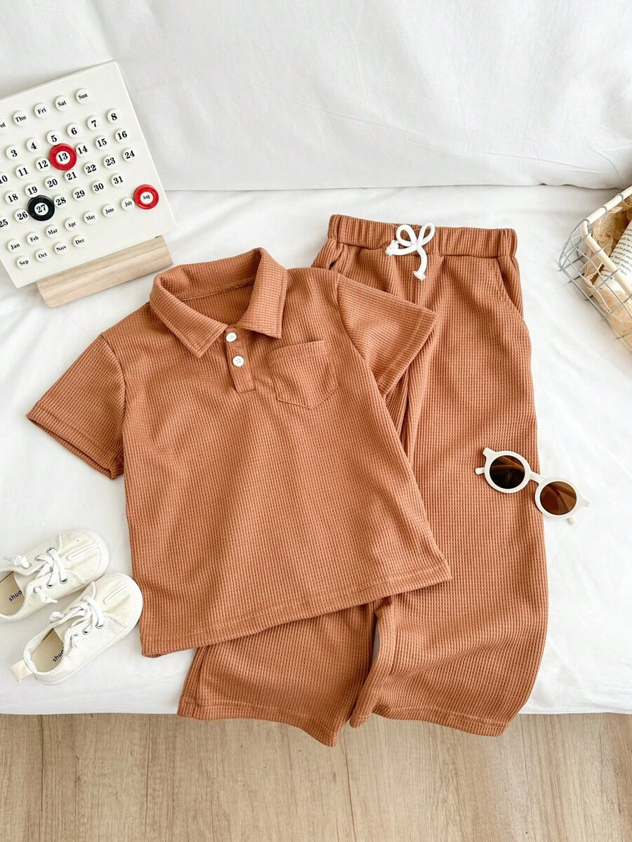 SHEIN 2pcs Young Boy Pocket & Button Decor Casual Solid Color Polo Shirt + Drawstring Decor Casual Solid Color Straight Pants Set - Brown - View 1