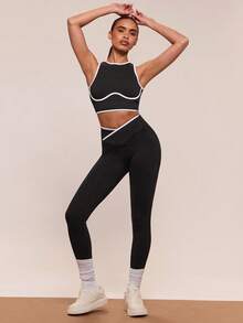 SHEIN BAE Damski krótki top z asymetrycznym stanem i legginsami sportowymi, zestaw do ćwiczeń na siłownię, strój fitness, zestaw legginsów do ćwiczeń, żebrowany zestaw do ćwiczeń dla kobiet - Czarne - Zobacz 1