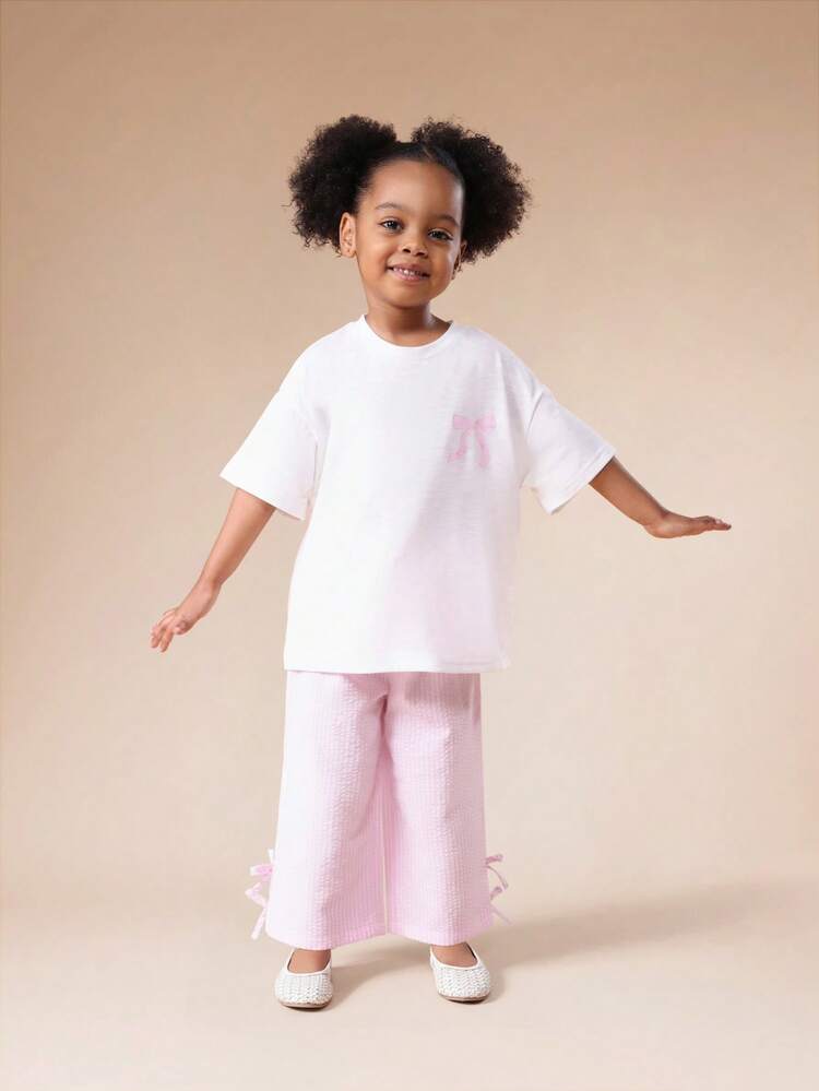 Ensemble t-shirt oversize et pantalon large avec détails de nœud