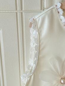 SHEIN 少女优雅度假圆领蕾丝拼接3D立体花朵装饰大蝴蝶结露背修身A字无袖连衣裙，杏色少女仿珍珠连衣裙，奶油色女童连衣裙，象牙色女童连衣裙 - 香檳色 - 查看 9