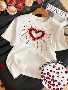 Resyla Áo thun nữ cổ tròn tay ngắn đính đá giả hình trái tim rỗng - trắng - Xem 1