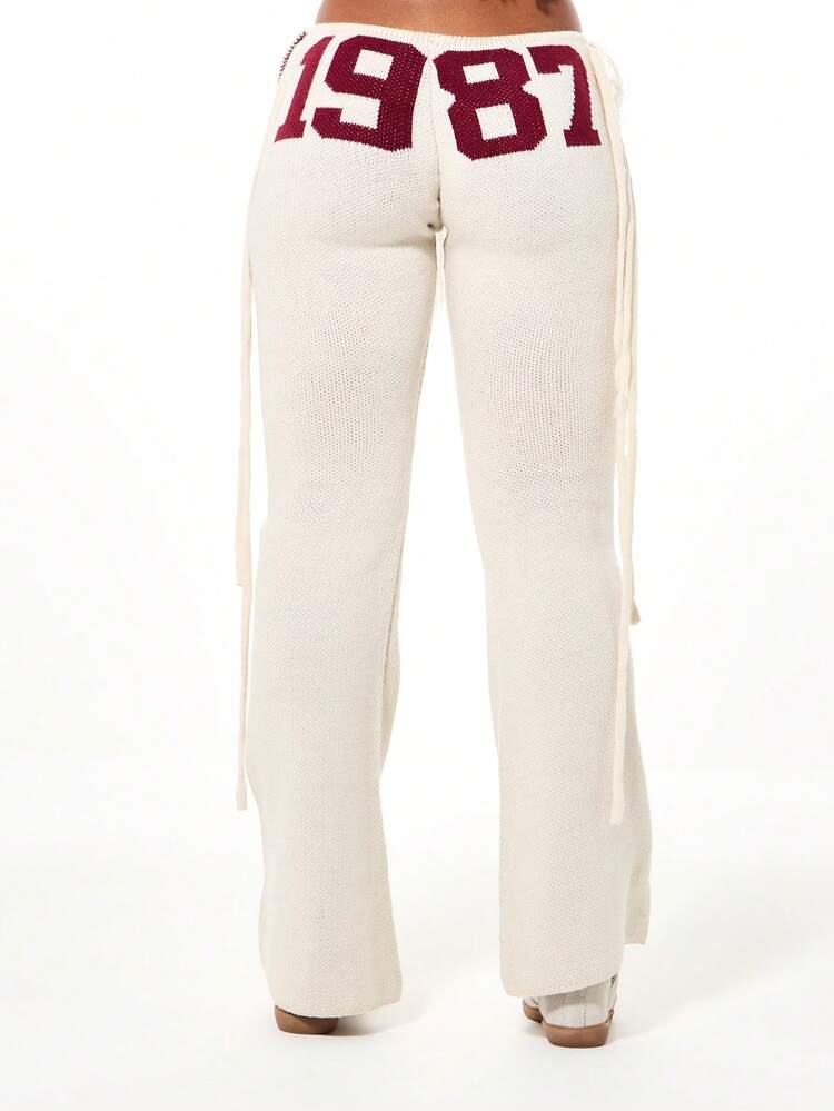 SUMWON WOMEN Cream Knit Flare Pants With Burgundy Stripes