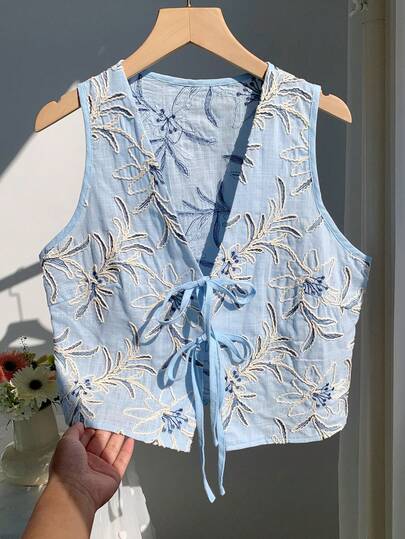 Comfortcana Blusa sin mangas con cuello en V, bordado floral y lazo delantero para vacaciones de verano de mujer