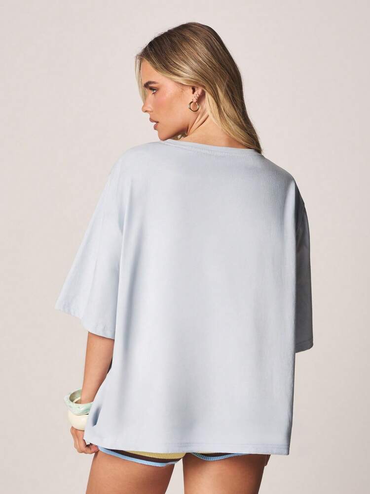 MISSGUIDED Triff mich am Strand Grafik T-Shirt, oversized Kurzarm Rundhals Baumwoll T-Shirt, Sommer Urlaub Statement Top