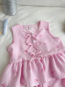 Genkimix Kids Conjunto de 2 piezas de top sin mangas con volantes y lazos a cuadros, y shorts para niña, para verano - Rosa - Ver 7