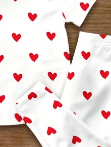SHEIN Conjunto de pijama infantil feminino com estampa de corações e bolinhas, modelagem justa, gola redonda e calça de manga curta. Ideal para o verão e o outono. Estilo delicado e moderno, perfeito para o dia a dia. Conjunto de duas peças, confortável e aconchegante, ideal para a primavera e o verão. Perfeito para o Dia dos Namorados. - Multicolorido - Ver 5