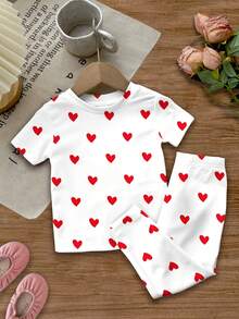 SHEIN Conjunto de pijama infantil feminino com estampa de corações e bolinhas, modelagem justa, gola redonda e calça de manga curta. Ideal para o verão e o outono. Estilo delicado e moderno, perfeito para o dia a dia. Conjunto de duas peças, confortável e aconchegante, ideal para a primavera e o verão. Perfeito para o Dia dos Namorados. - Multicolorido - Ver 2
