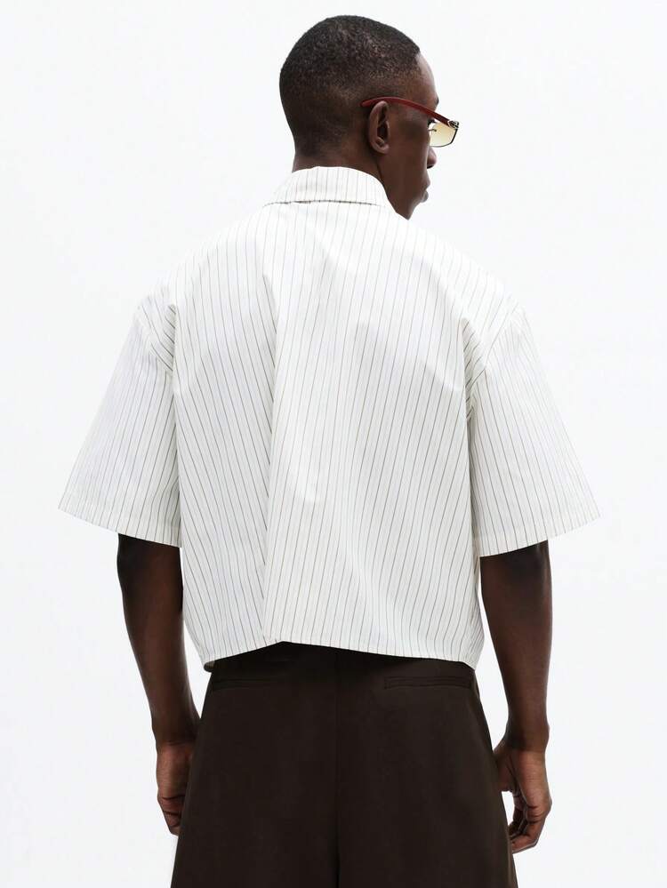 半袖縦縞ボタンシャツ