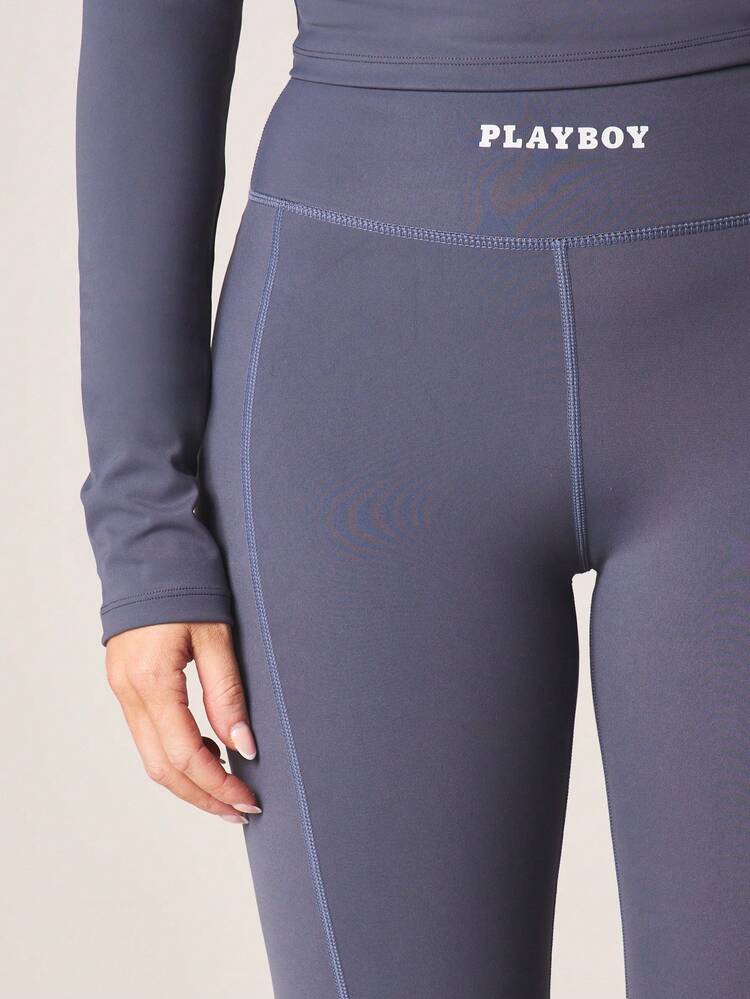 Missguided x Playboy Pantalones de yoga acampanados de talle alto con detalle de cintura con logo