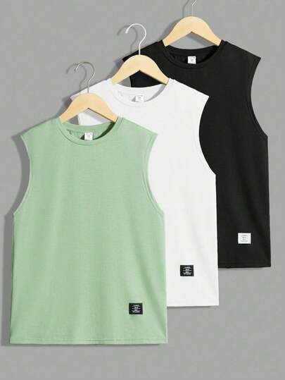 SHEIN Set de 3 piezas Camiseta de punto sin mangas con cuello redondo y gráfico de letras de color liso en estilo casual urbano para adolescentes varones, con ajuste relajado, versátil, de tela suave, adecuado para uso diario, escuela, salidas, actividades al aire libre, festivales de música, vacaciones, fiestas, vacaciones de verano en la playa, primavera/verano