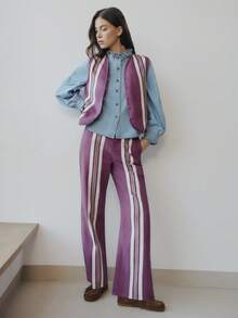 Nöista 高腰阔腿裤采用醒目的紫色、白色和深色调竖条纹设计，与无袖背心完美搭配。这套配套服装适合春夏穿着，是女士的理想之选。 - 彩色 - 查看 4