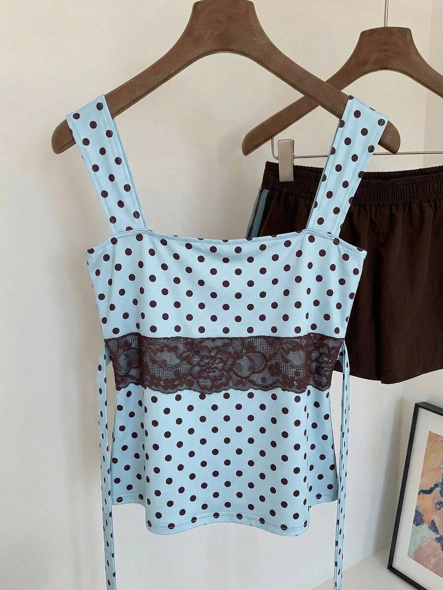 Comfortcana Mẫu áo hai dây thời trang nữ Xuân/Hè 2026 này có thiết kế phối màu ren chấm bi, phù hợp cho nhiều dịp như hè, Giáng sinh và Năm mới. Có thể mặc như áo dự tiệc, đồ đi biển, áo sơ mi nữ thanh lịch, áo sơ mi nữ thường ngày, áo chấm bi đi nghỉ mát, áo xanh retro hoặc áo hai dây thông thường. - Màu xanh lam - Xem 1