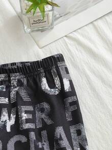 SHEIN GraphicGems Bộ đồ ngủ 2 món cho bé trai tuổi teen, in chữ tiếng Anh, cổ tròn, tay ngắn, quần short, chất liệu mềm mại thoáng khí, thích hợp mặc mùa hè. - Nhiều màu - Xem 6