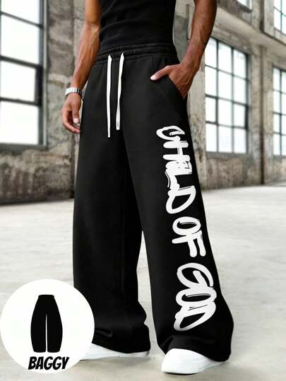Manfinity EMRG Baggy Pants Black & White Contrast Stripe Casual Pants, Oversized Cleaver Leg Silhouette Sweatpants, American Streetwear Style, Relaxed Fit, Versatile Men's Sweatpants Mens Letter Print Elastic Pants Bottoms  Valentines Gifts For Boyfriend