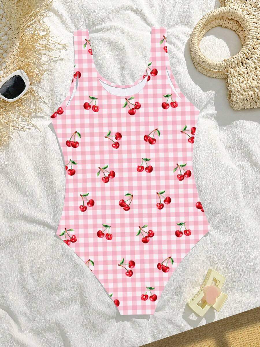 SHEIN Áo tắm liền thân in hình quả anh đào dành cho bé gái tuổi teen, kiểu dáng đi biển và nghỉ dưỡng.