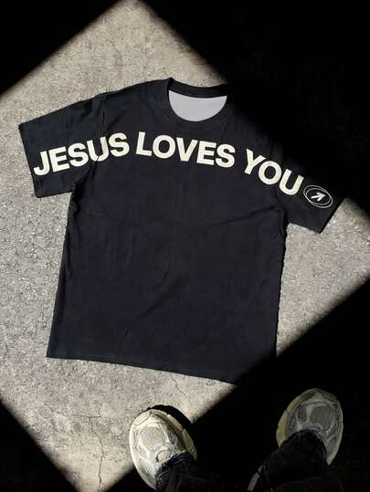 Manfinity Dauomo Camiseta con gráfico de letras grandes que dice "Jesús te ama", un regalo para creyentes de Dios y Jesús, un presente para él, nuevo estilo primavera/verano 2026