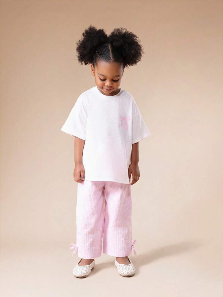 Ensemble t-shirt oversize et pantalon large avec détails de nœud